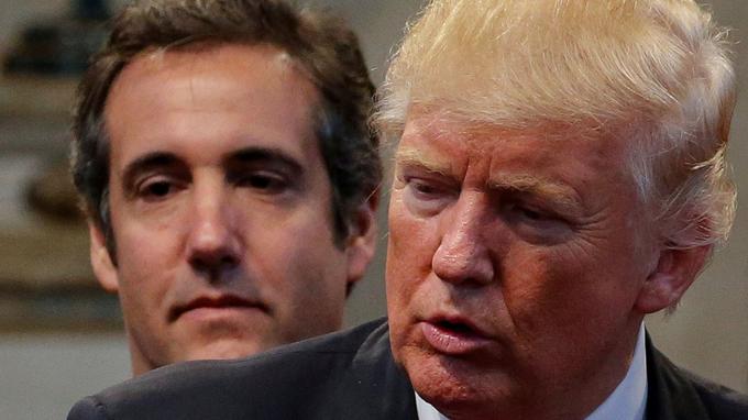 FILE PHOTO: Cohen joins supporters praying over during a campaign stop at the New Spirit Revival Center church in Cleveland Heights, Ohio